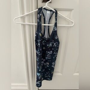 Blue patterned ivivva tank top.